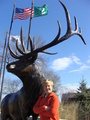 #8: Cynthia poses at the namesake of Elk Grove Village