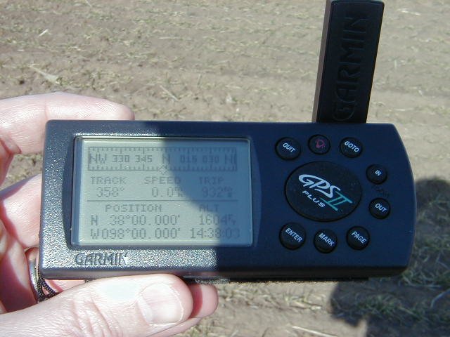 Hand held GPS while standing on the point