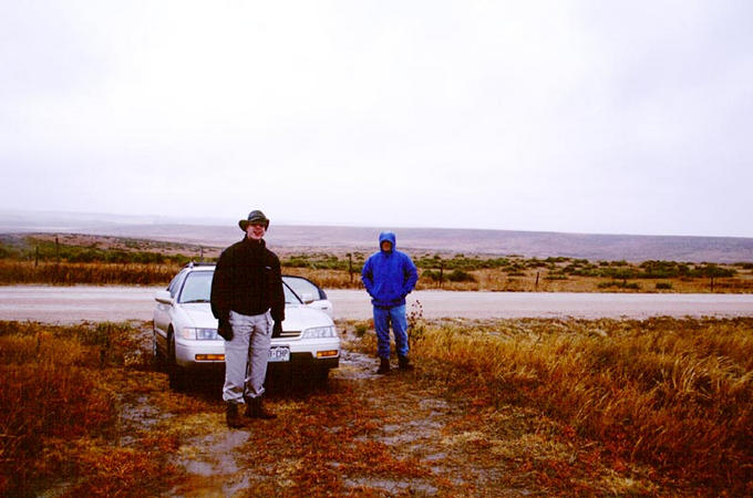 The car parked 0.8 miles from the confluence.  Dan (left) and Ben (right)