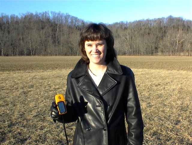 Valerie holds the GPS for confluence 38N 85W