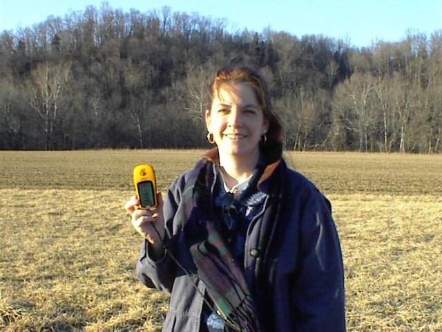 Sharon holds the GPS for confluence 38N 85W