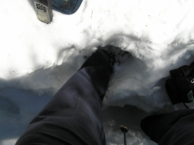 My unprotected feet in the snow at the confluence.  Better head out before they freeze.