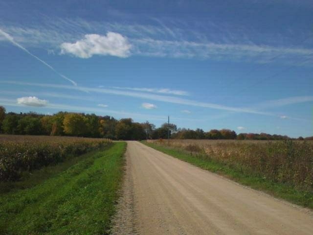 Looking west along the road toward a county park