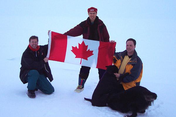 Staking a temporary claim to an extra square foot of ice for Canada, just what we need. L-R, Josh, Derek, Tony