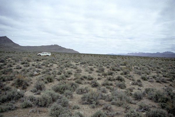 View north with car on dirt road