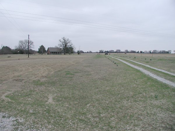 Area of the confluence in field behind house