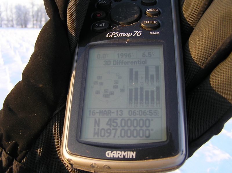 Gloved but frozen fingers:  Holding GPS receiver at 45 North 97 West.
