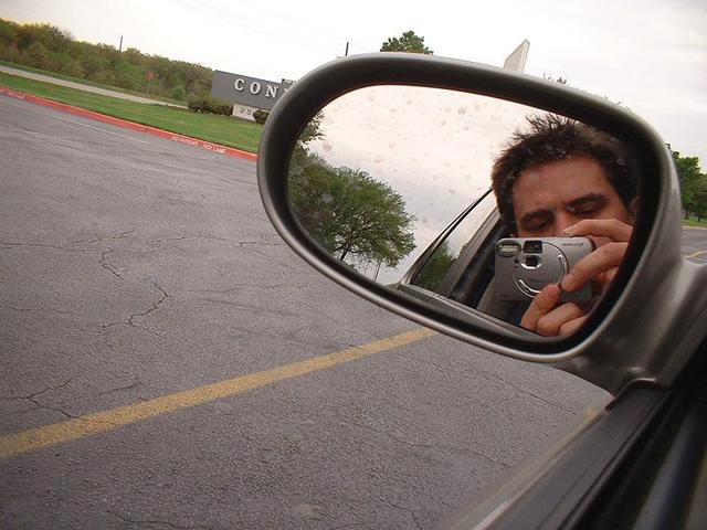 Hunter, prey, and dirty side mirror.