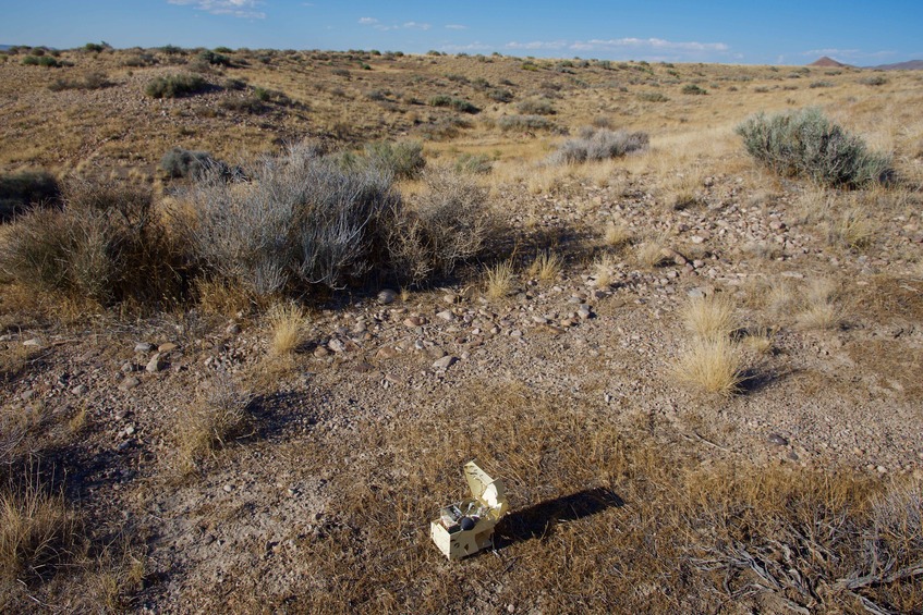 The confluence point lies in desert terrain near the eastern shore of Sevier (Dry) Lake.  A piece of broken electronic equipment marks the point.