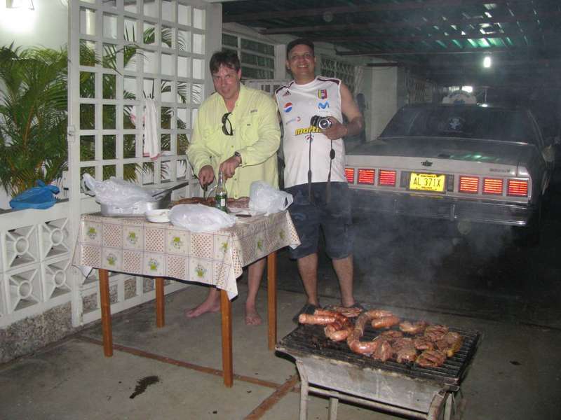 CELEBRATING AT NIGHT WITH A GREAT BBQ HERNAN AND TOMAS ARE OUR CHEF