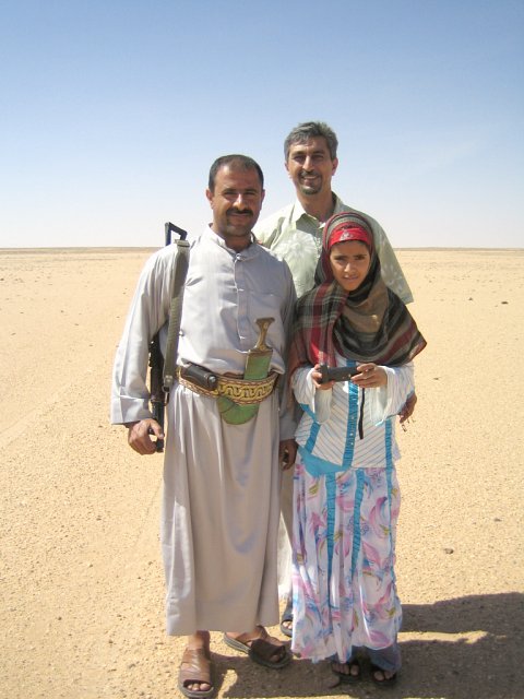 Tal`at, Yasmin, and `Abdullah with the Kalashnikov!