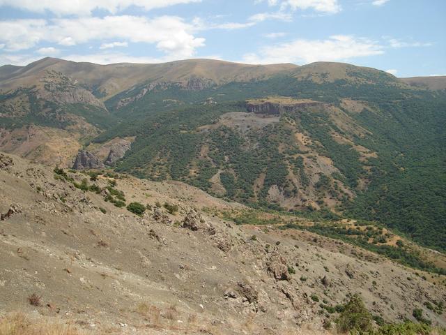 two kilometers to go, down into valley and up the slope on the opposite side