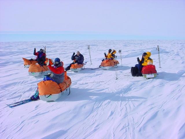 The team resting at the confluence point