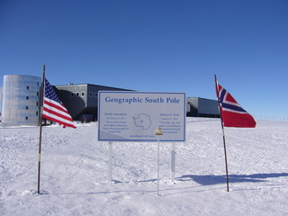 #1: Official South Pole marker (as of 2011) and the Amundsen-Scott South Pole Station