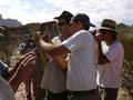 #6: Martin taking pictures of the precise location. Marcelo and Fernando holding GPSs