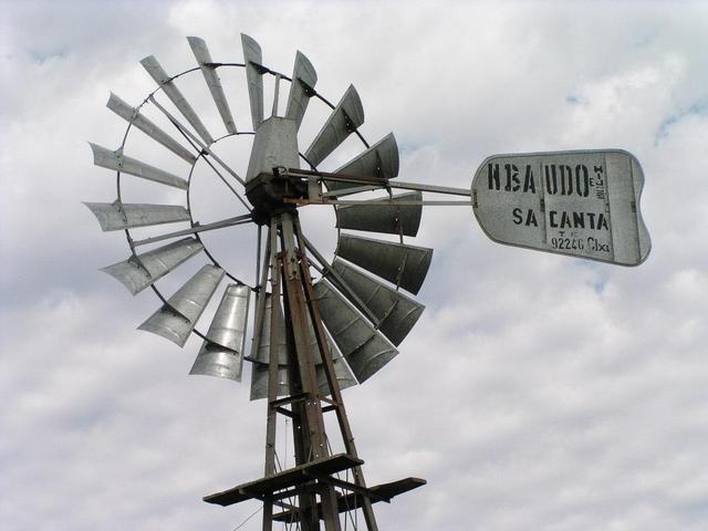 the nearby wind wheel, driving the water pump