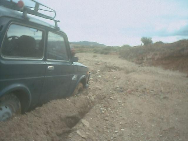 Encajada en barro en arroyo