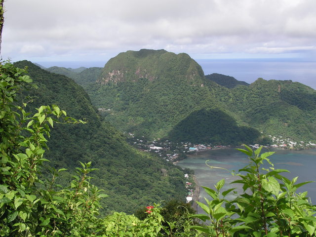 Rainmaker Mountain often catches clouds at Pago Pago.