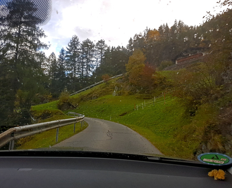 A paved road climbs up to Granstein