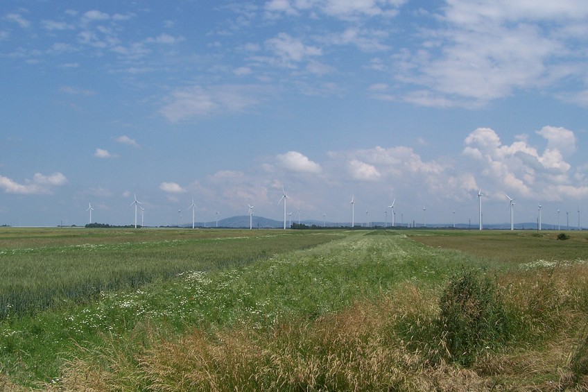 Wind turbines and hills on the horizon