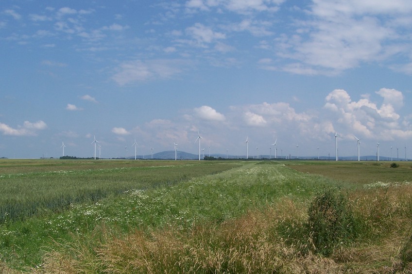 Wind turbines and hills on the horizon