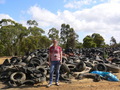 #7: Targ in front of a large pile of old tyres