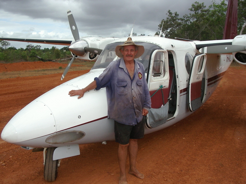 Station staff "Lewy" with the first ever mail plane to land at Bramwell.