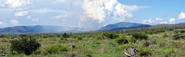 #3: From the road 4 km away, the confluence is just to the right of the bushfires in the hills