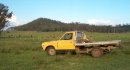 #2: Neil's farm. The confluence is over the hill behind his ute.
