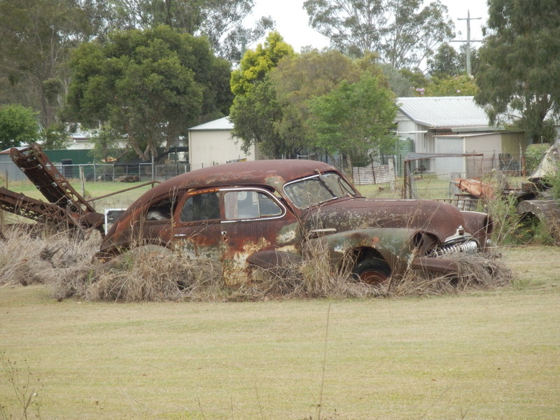 Car in the Yard Nextdoor