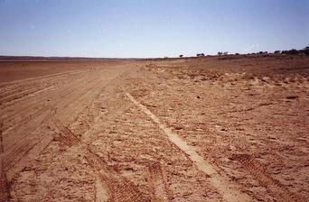 #1: North view into Northern Territory. Poeppel's corner marker is just a bit to the right of center in amongst the small shrubs on the horizon.