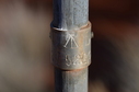 #9: Small tag on the Pole