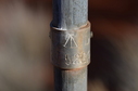 #9: Small tag on the Pole