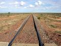 #7: Transcontinental railway (Sydney to Perth, 4,352km, 3 days/nights travel!) crossing near Coondambo Station. This railway includes the world's longest straight of 478km