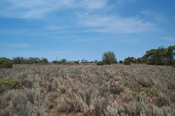 Looking West, notice the train line in the background