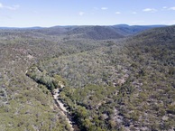 #11: View West, from 120m above the point