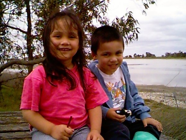 Jamie and Vicky sitting on one of the picnic tables