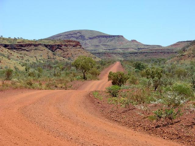 The road south of Mt Florence with the Hammersley Range in the distance
