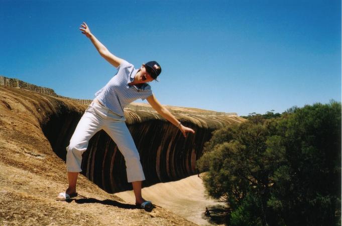 Kate "surfing" at Wave Rock