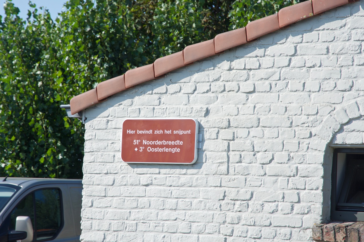 A close-up of the sign on the front of the house, announcing its special status