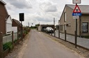 #8: Small street going towards the field