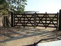 #8: Porteira trancada. Gate closed with padlock.