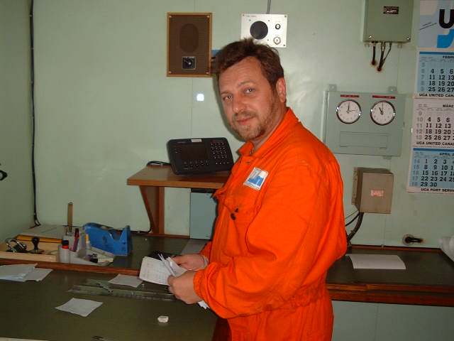 2nd Officer Volodymyr Sydorenko studying the draft of the report