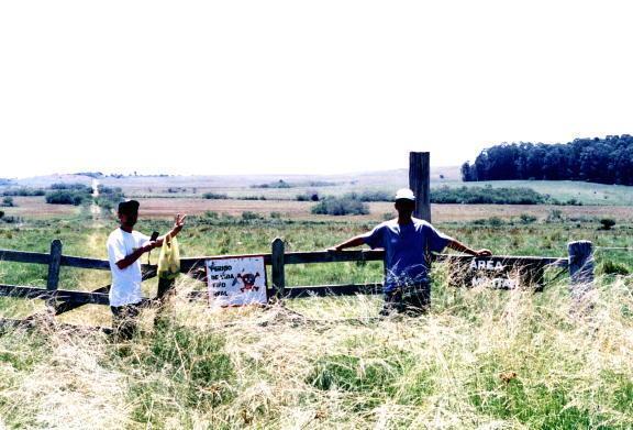 Danger warnings at a fence