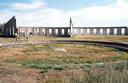 #7: The remains of the turntable and roundhouse stand stark as ancient ruins against the prairie sky