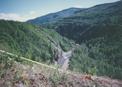 #5: View south up Muskeg River valley towards confluence. Loaded seismic shot hole marked by ribbon.