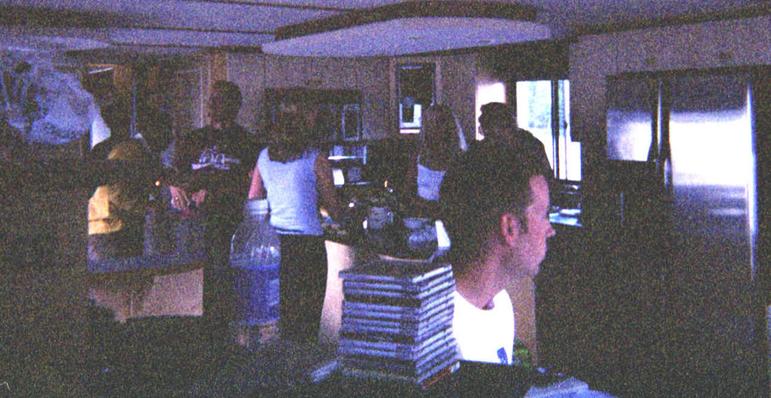 The crew making dinner in the well-appointed kitchen