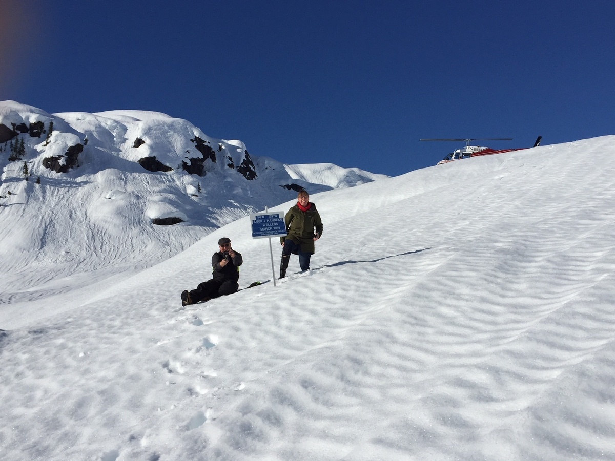 Hanneke and Dean upslope with helicopter