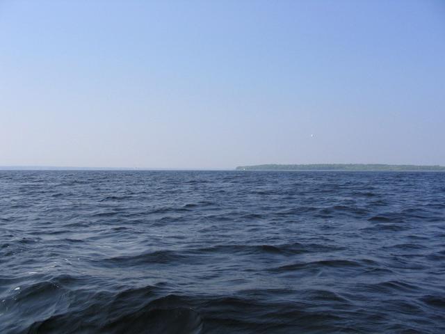 confluence point facing north with Cox Pt lighthouse