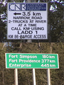#7: barge access sign, and signpost at kilometer 140 marker